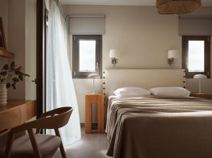 A bed or beds in a room at Cielo villas - An Authentic Mediterranean Living