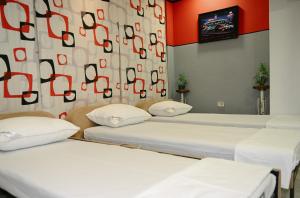 Postel nebo postele na pokoji v ubytování Hotel Hostel Bonito