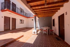 a room with a table and chairs in a building at New Puerto Vallarta Retreat with Private Terrace in Puerto Vallarta