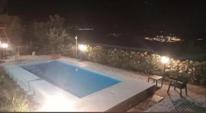 The swimming pool at or close to Il Podere di Massi