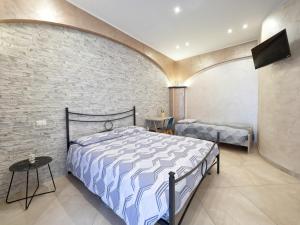 Postel nebo postele na pokoji v ubytování Eraldo Bed and breakfast