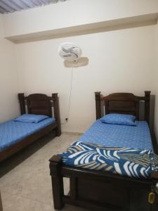 A bed or beds in a room at Shammah-casa de descanso