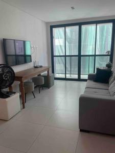 Μια τηλεόραση ή/και κέντρο ψυχαγωγίας στο Meu cantinho no paraíso!