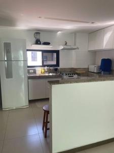 Η κουζίνα ή μικρή κουζίνα στο Meu cantinho no paraíso!