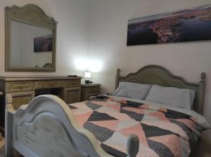 Кровать или кровати в номере Ta' Marija Home