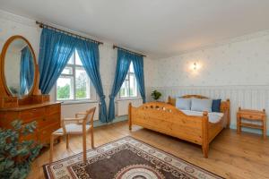 Posezení v ubytování Kursi Summer Manor