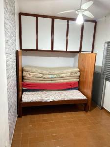 Ένα ή περισσότερα κρεβάτια σε δωμάτιο στο Apartamento Praia da Guilhermina