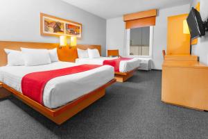 Postel nebo postele na pokoji v ubytování City Express by Marriott Celaya Parque