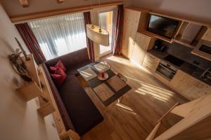 an overhead view of a living room in a tiny house at Piburg Studios in Oetz