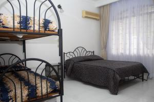 メルガルにあるVilla Ana María Melgarのベッドルーム1室(二段ベッド2組、ベッド1台付) +29枚の写真