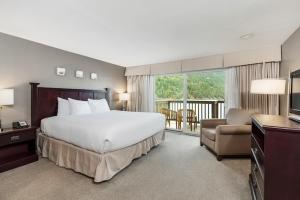 Postel nebo postele na pokoji v ubytování Rosario Village