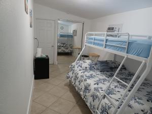 a bedroom with a bunk bed and a mirror at B6 Best Value on Private Bedroom with Private Bathroom in Little Havana, Miami in Miami