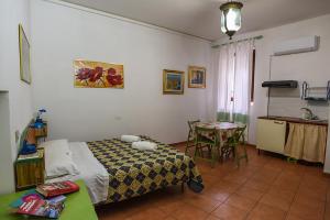 Letto o letti in una camera di B&B ABACO