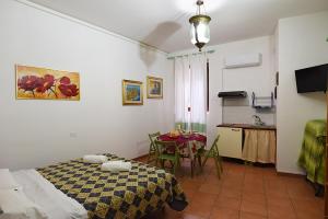 Letto o letti in una camera di B&B ABACO