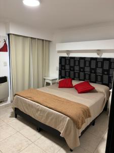 Ένα ή περισσότερα κρεβάτια σε δωμάτιο στο Robinson Apartamentos SOLO FAMILIAS +44 φωτογραφίες