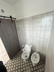 Koupelna v ubytování Tempo Suites