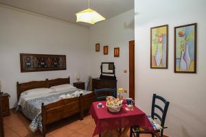 Letto o letti in una camera di B&B ABACO
