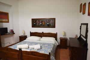 Letto o letti in una camera di B&B ABACO
