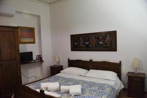 Letto o letti in una camera di B&B ABACO