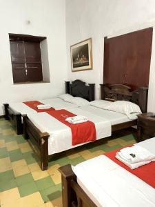 Habitación con 2 camas en Hotel Casa Posada Don Chepe, en San Gil