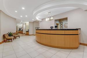 a lobby of a hospital with a reception desk at Comfort Suites in Murfreesboro