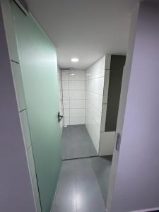 Vonios kambarys apgyvendinimo įstaigoje Residencial Alves