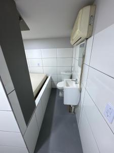 Vonios kambarys apgyvendinimo įstaigoje Residencial Alves
