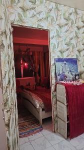 Postel nebo postele na pokoji v ubytování Laxmi Happy Home in Pune