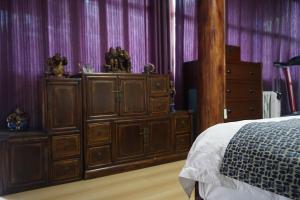 Jayden NAXI Healing Lodge臣安纳西疗愈小院 - Namaste客房内的一张或多张床位