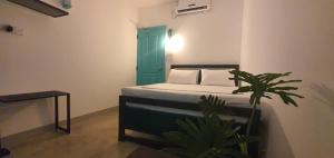 Postel nebo postele na pokoji v ubytování Hello Airport Hotel, Katunayaka