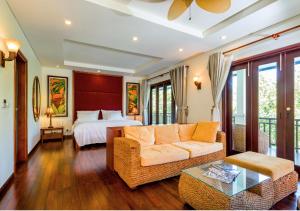 Postel nebo postele na pokoji v ubytování Premier Central Pool Villa Danang + 58 fotografií