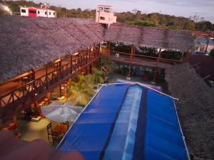 an overhead view of a resort with a swimming pool at El Bunker 9 in Iquitos