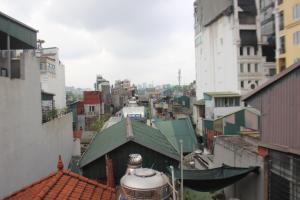 an overhead view of a city with buildings at Hanoi Little Hotel in Hanoi