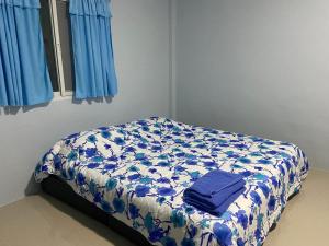 Ένα ή περισσότερα κρεβάτια σε δωμάτιο στο Banma homestay