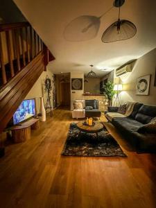 TV a/nebo společenská místnost v ubytování La villa luna and spa + 7 fotografií