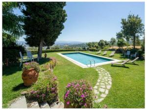 Der Swimmingpool an oder in der Nähe von Villa Colomba Comfortable holiday residence
