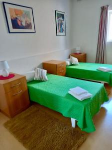 Postel nebo postele na pokoji v ubytování Malta Crown guesthouse