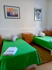 Postel nebo postele na pokoji v ubytování Malta Crown guesthouse