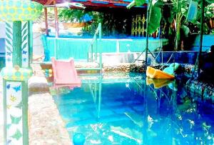 Πισίνα στο ή κοντά στο DMI Hotels and Apartments, Tabaco City Albay by RedDoorz