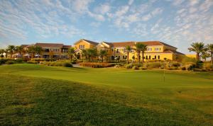 a golf course with houses and a green at Arabian Ranches Golf Club in Dubai