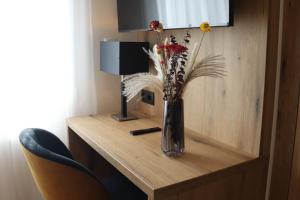 TV a/nebo společenská místnost v ubytování Hotel-Restaurant Zur Traube