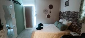 Postel nebo postele na pokoji v ubytování Studio cosy + 5 fotografií