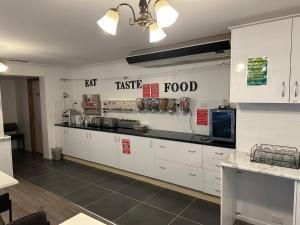 Kuchyň nebo kuchyňský kout v ubytování Allan Cunningham Motel