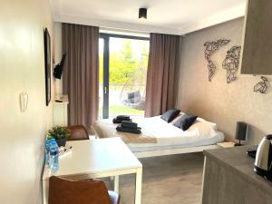 Posteľ alebo postele v izbe v ubytovaní Apartament B004 - Residence Jastrzębia Góra