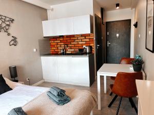 Posteľ alebo postele v izbe v ubytovaní Apartament B004 - Residence Jastrzębia Góra