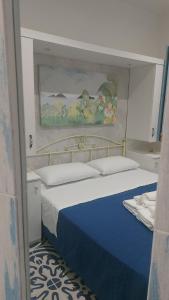 Llit o llits en una habitació de Benvenuti al Sud B&B
