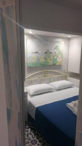 Llit o llits en una habitació de Benvenuti al Sud B&B