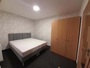 Posteľ alebo postele v izbe v ubytovaní Penzion V Maštali