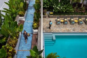 an overhead view of a swimming pool at a hotel at Viroth's Hotel in Siem Reap