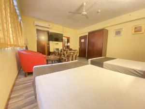 Postel nebo postele na pokoji v ubytování Astoria Hotel